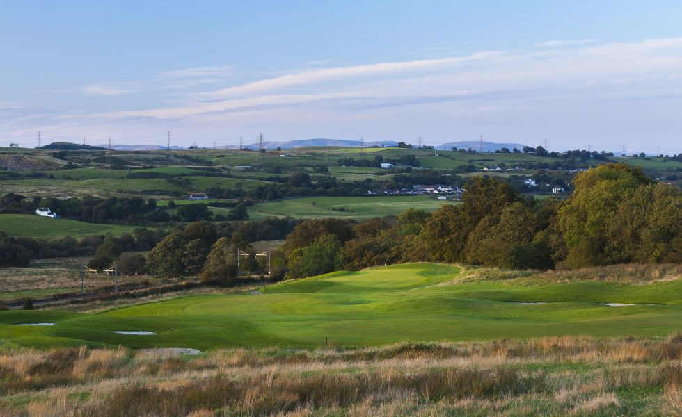 Enjoy a round of golf on the scenic course at DoubleTree by Hilton Glasgow Westerwood Spa & Golf Resort – A picturesque golfing experience.