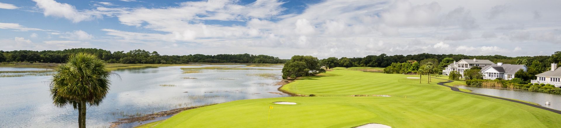Escape to the serene beauty of Oak Point Golf Course at Kiawah Island Golf Resort. This image invites you to a premier golfing destination, showcasing meticulously designed fairways amidst the natural splendor of Kiawah Island.
