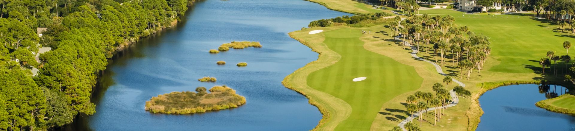 Escape to the natural beauty of Osprey Point Golf Course at Kiawah Island Golf Resort. This captivating image showcases the stunning fairways and lush landscapes of one of South Carolina's premier golf destinations.